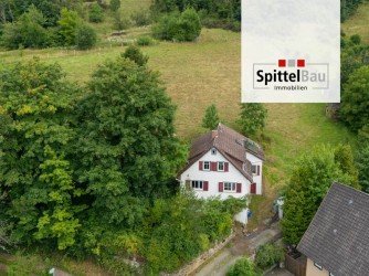 Hauptbild Sanierungsbedürftiges Einfamilienhaus in Hanglage zu verkaufen!